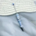 Creative beaded ballpoint pen with light blue and white cream glue decoration design - Aqua Blue