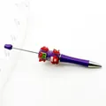 DIY Christmas beaded ballpoint pen with purple sugary texture and festive charms - Fluorescent Purple