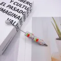 Glitzernder Kugelschreiber mit Perlen und Strasssteinen sowie roten Kirschmotiven - Kleine Kirsche