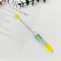 Lindo bolígrafo de cuentas DIY amarillo de 4 colores con barril transparente y vara - Punta de Bala de 1,0 mm / Amarillo Macaron