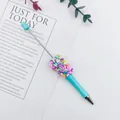 Lindo bolígrafo turquesa con cuentas de caramelo de colores en forma de corazón - Punta de bala de 1,0 mm / Azul Claro Caramelo (50)