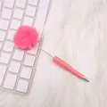 Decorative pink ballpoint pen featuring a large fluffy pom-pom top and silver accents - Barbie Pink