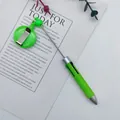 Retractable 4-color ballpoint pen in green with matching easy-pull badge reel clip - 1.0mm Bullet Tip / Green