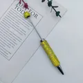 Luxuriöser DIY-Kugelschreiber mit gelben Strasssteinen und drehbarer Metallspitze. - Gelb