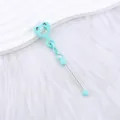 Pendentif en silicone bleu menthe en forme de cœur avec un joli visage souriant - Bleu clair