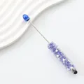 Elegant beaded stylus pen with purple crystals and pearls on white background. - 2-Klein Blue