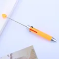 Lindo bolígrafo amarillo de cuatro colores con varilla larga para decoración de cuentas - Naranja Macaron