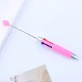 Bolígrafo rosa multicolor versátil con punta de puntero telescópica incorporada - Rosa Macarrón