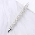 Elegant silver ballpoint pen fully covered in sparkling white rhinestones for office - White (Silver Parts)