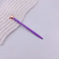 Elegant purple metal ballpoint pen featuring a rose gold heart ornament at the top - Purple