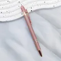 Elegant rose gold ballpoint pen with a matte pink barrel and metallic accents - With Spiral Wire / 1.0 Bullet Tip