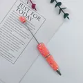 Decorative handmade beaded ballpoint pen featuring pink bubble beads and small star accents - Barbie Pink