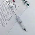 Handcrafted iridescent mermaid beaded ballpoint pen with star charms for journaling - White