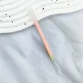 High-quality pastel glitter gel pen with a peach body and clear cap for DIY journal art - High Gloss Orange