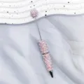 Elegant pink pearl and crystal beaded ballpoint pen for luxury stationery and DIY gifts. - 1.0mm Bullet Tip / Pink