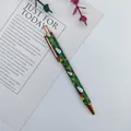 Elegant green metal Christmas ballpoint pen with snowman prints and rose gold accents - Snowman / Green