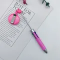 Pink retractable 4-color ballpoint pen with badge reel on text prop card - 1.0mm Bullet Tip / Macaron Pink