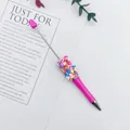 Lindo bolígrafo rosa con cuentas de corazón de colores y dijes de corazón dulces - Punta de bala de 1,0 mm / Rosa Fluorescente (58)