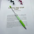 Light green crystal-filled ballpoint pen with transparent barrel and silver accents - Macaron Green