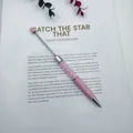 Elegant pink ballpoint pen filled with sparkling pink crystals on a white text background - Khaki Light Pink