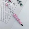 Elegant DIY ballpoint pen decorated with pink crushed stone beads for creative writing - Pink