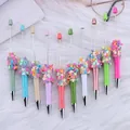 Bolígrafos de cuentas de colores con dijes de corazón en varios tonos para el SKU - Punta de bala de 1,0 mm / Multicolor