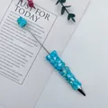 Bolígrafo artesanal DIY decorado con virutas de piedra natural azul de alta calidad - Azul claro