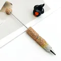 Stylo à bille à perles recouvert de strass dégradé champagne et argent étincelant - Dégradé Doré