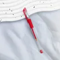 High-quality 0.5mm red gel pen featuring a transparent barrel and soft rubber grip - 0.5mm / Red