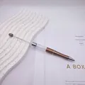 Rose gold DIY beadable pen featuring a hollow transparent tube for custom beads - 1.0mm Bullet Tip / Coffee