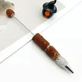 Stylo à bille de luxe avec dégradé de strass en ambre et une finition argentée - Orange dégradé