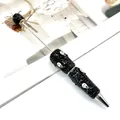 Halloween DIY beaded ballpoint pen featuring black rhinestones and white ghost face - Black Rhinestone Ghost Face