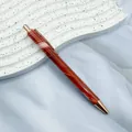 Elegant metal ballpoint pen with red marble pattern and rose gold accents for smooth writing - 1.0mm Bullet Tip / Burgundy