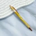 Elegant yellow marble pattern ballpoint pen with rose gold metal accents - 1.0mm Bullet Tip / Orange