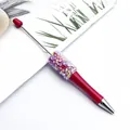 Elegant pink DIY beaded ballpoint pen featuring colorful iridescent sequin clusters for gifts - Bright Red
