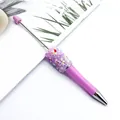 Purple DIY ballpoint pen decorated with shiny pink pearls and iridescent sequins - Macaron Pink
