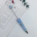 DIY beaded ballpoint pen with light blue iridescent bubble beads and rhinestones - Light Blue
