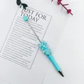 Elegant turquoise ballpoint pen decorated with handmade pearls and sparkling crystals - Candy Light Blue