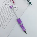 Handmade purple bubble bead ballpoint pen featuring sparkling rhinestones and star charms - Purple