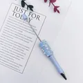 Elegant light blue ballpoint pen decorated with sparkling crystals and white faux pearls - Aqua Blue