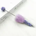 Purple handmade ballpoint pen decorated with soft pom-pom, faux pearls and rhinestones. - Deep purple