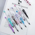 Handmade beaded ballpoint pens decorated with sugar pearls and crystal rhinestones. - Multicolor