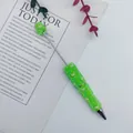 Handmade green beaded ballpoint pen with cute heart and iridescent bubble beads - 1.0mm Bullet Tip / Green