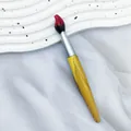Bolígrafo creativo con forma de antorcha de madera con diseño de llama y veta de madera - Rojo