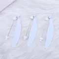 Set of 3 white feather-shaped beaded bookmarks with heart, star, and butterfly tops. - White