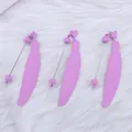 Purple DIY feather beaded bookmarks with star heart and butterfly charms on white fur - Light Purple