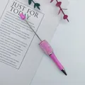Handmade pink DIY beadable pen decorated with iridescent mermaid beads and crystals - Macaron Pink