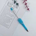 Light blue DIY beaded pen featuring translucent mermaid beads and sparkling rhinestones - Macaron Blue
