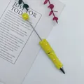 Yellow heart-patterned mermaid bead ballpoint pen, a stylish creative stationery gift. - 1.0mm Bullet Tip / Yellow