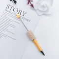 Elegant yellow beaded ballpoint pen featuring decorative white pearls and sparkling rhinestones - 1.0mm Bullet Tip / Macaron Orange